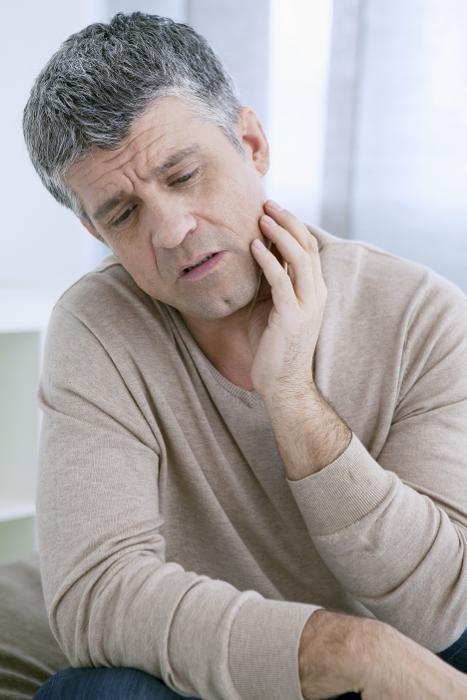 Man in Tooth Pain | Root Canals Moline, IL