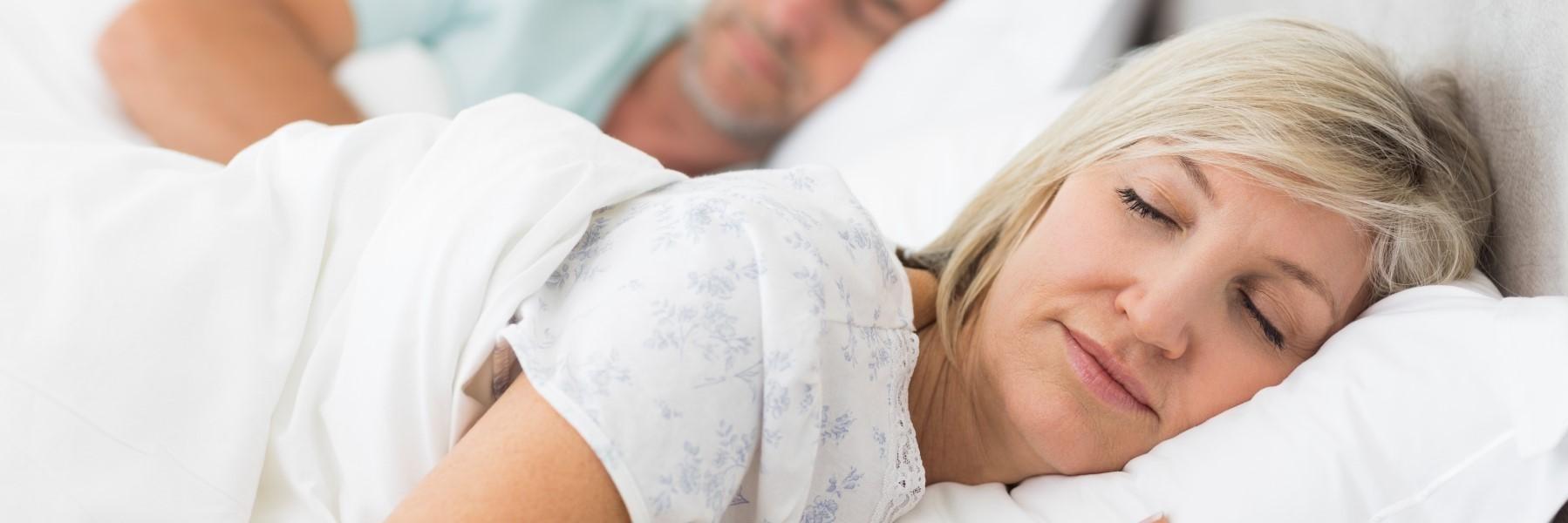 Woman sleeping peacefully | Sleep apnea treatment in Quad Cities area